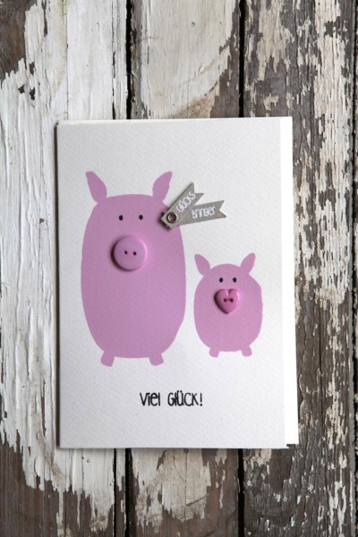 Knopfkarte. Schweine